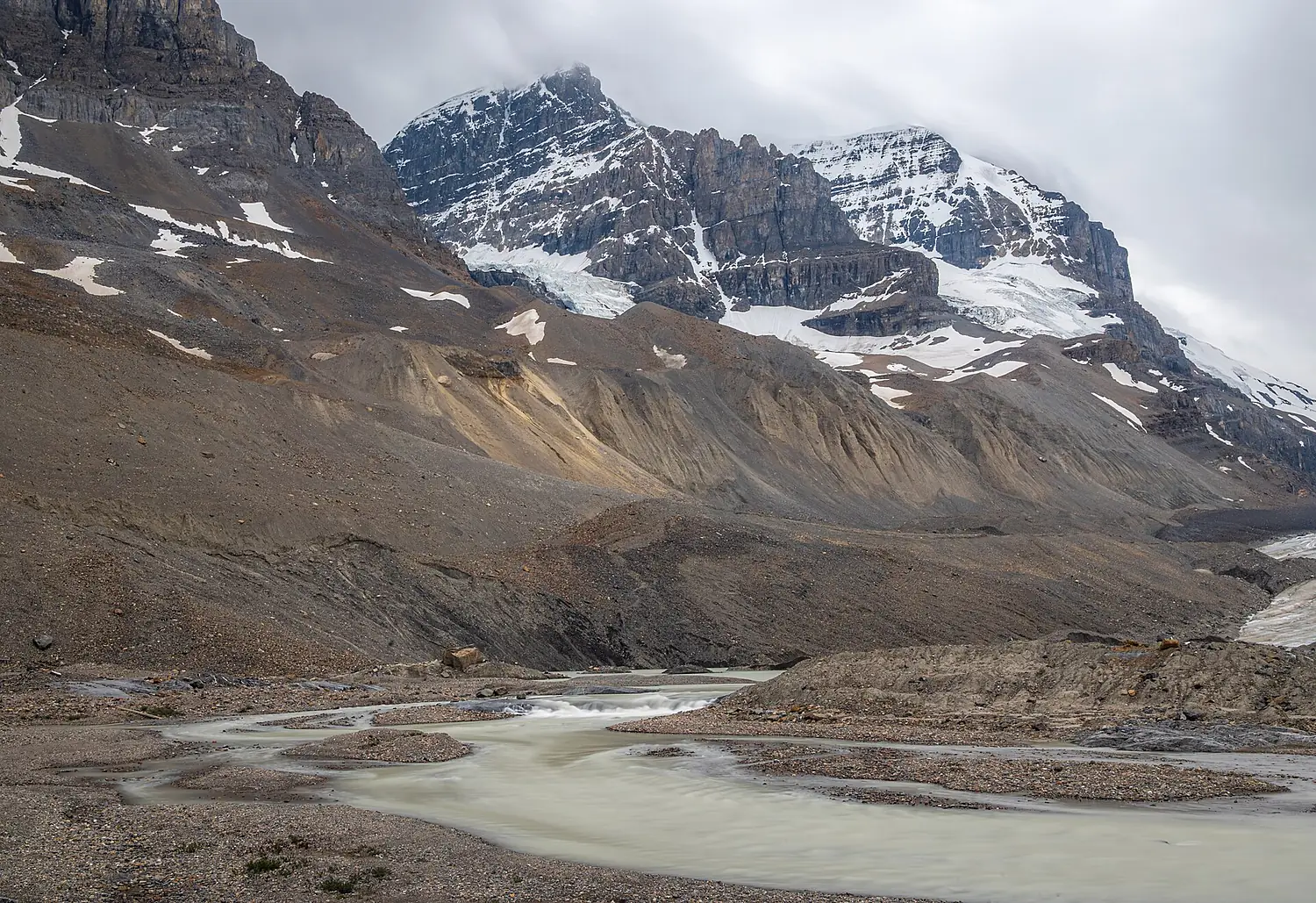 Meltwater at the terminus of the Athabasca Glacier, Jasper National Park, Alberta, Canada