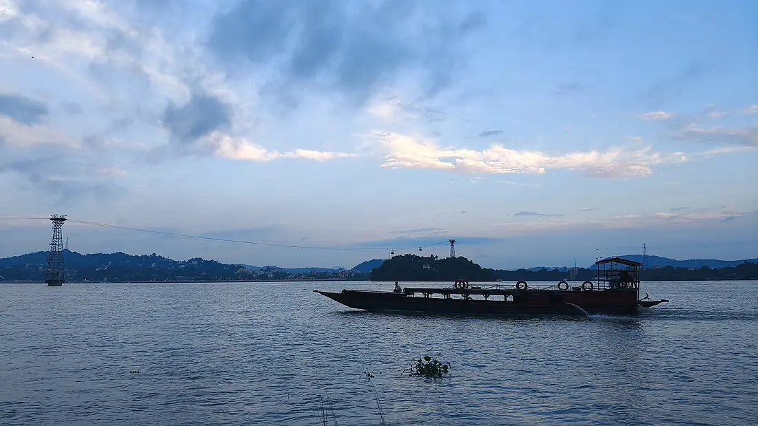 A Boat on the Brahmaputra River near umananda temple