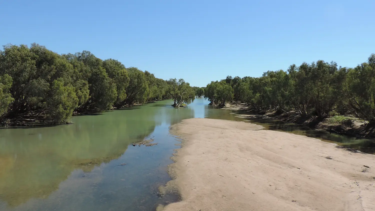 Looking downstream along the Flinders River while crossing on the Burke Developmental Road, Normanton, June 2019 02