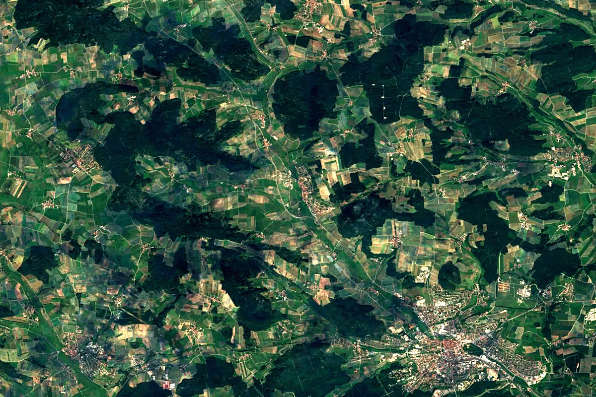 Main: satellite view of the source