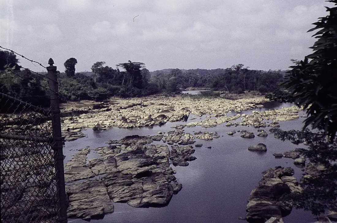 ASC Leiden - F. van der Kraaij Collection - 14 - 78 - A near dry rocky river bed between wooded bank - Saint Paul River area, Montserrado County, Liberia - 1977-1978